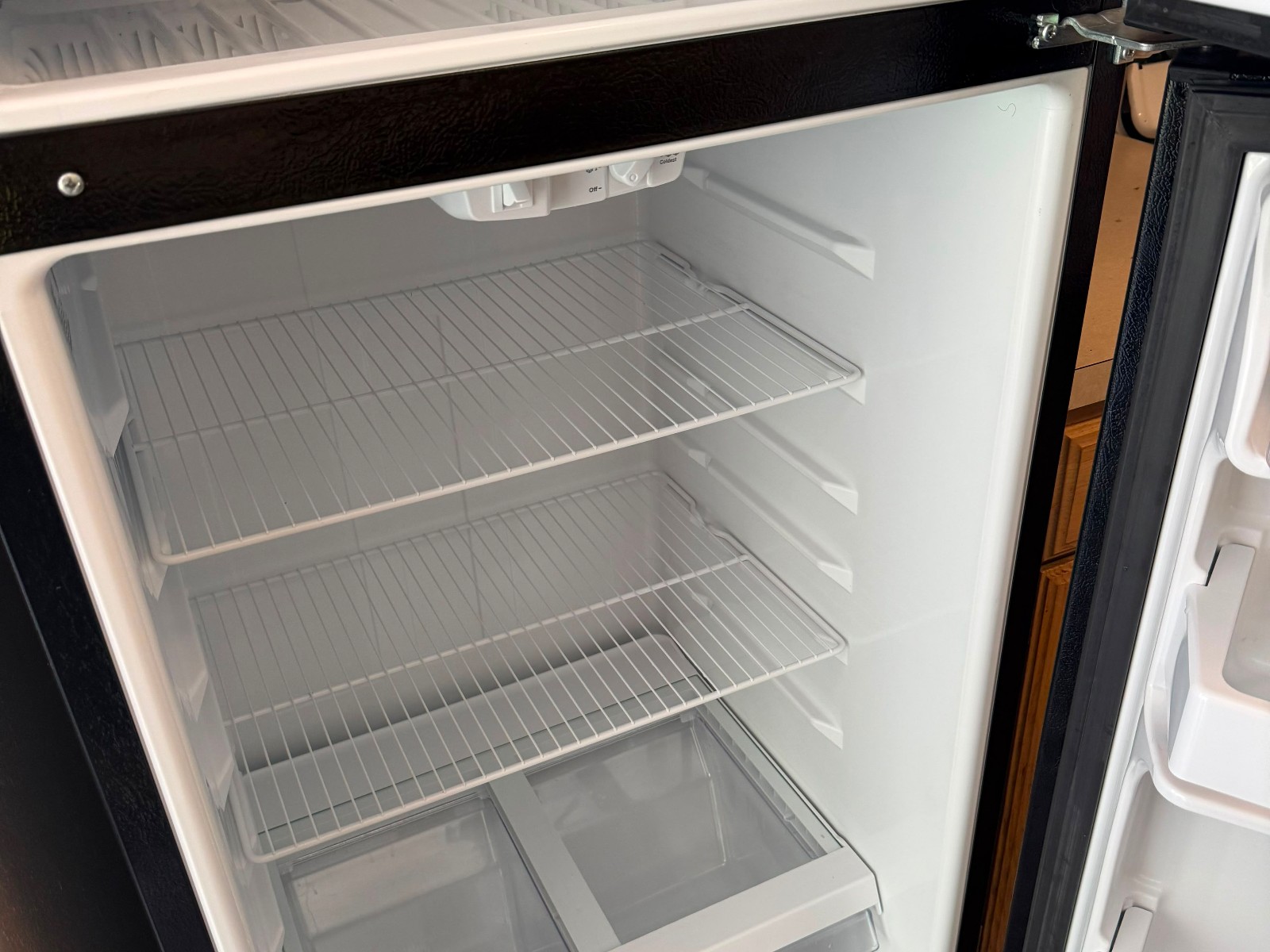 Spotless refrigerator interior after deep cleaning
