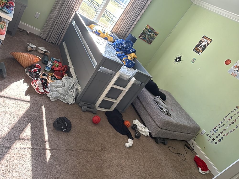 Cluttered bedroom before cleaning