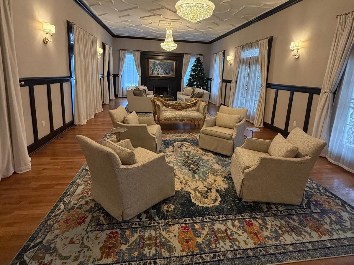 Elegant living room with chandelier, freshly cleaned